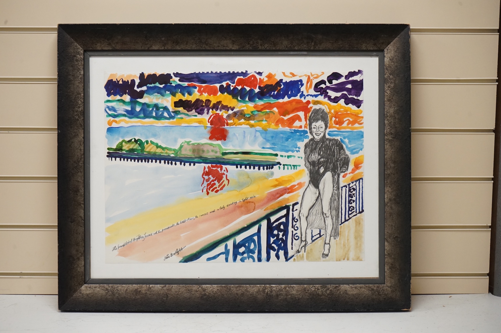 John Bratby RA (1928-1992), watercolour, ‘The Grand Hotel, Brighton Terrace with the promenade, West Pier, Sunset and a lady standing in light rain’, signed, 37 x 51cm